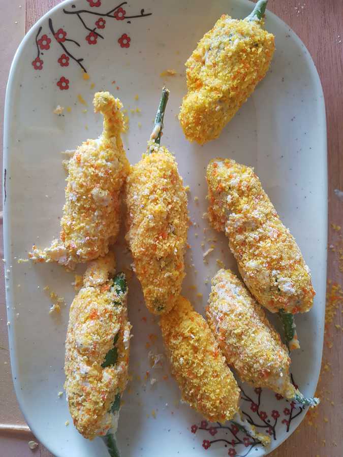 Jalapeno poppers coated with bread crumbs